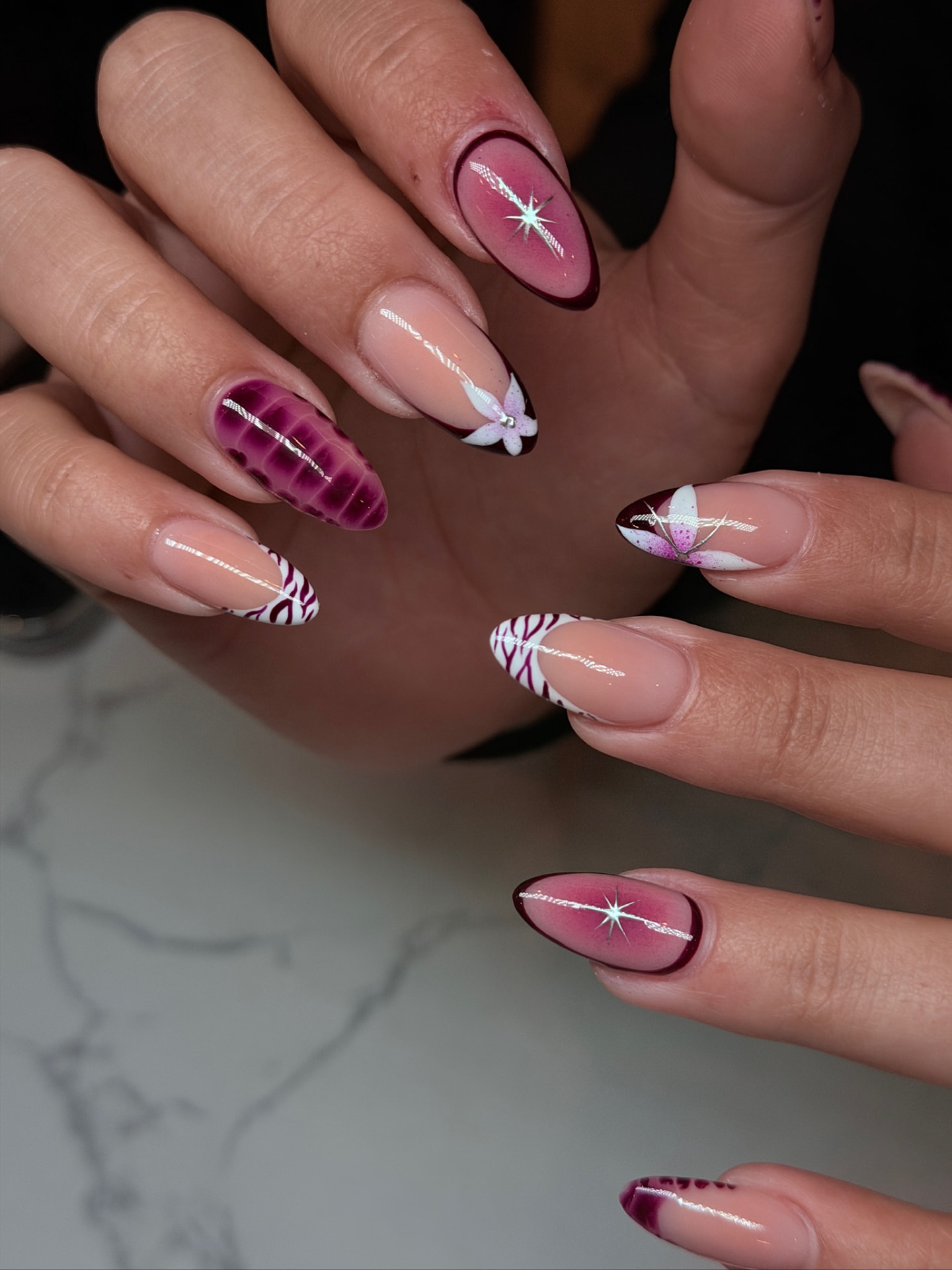 Blume Nail Bar - Luxury Nail Salon — almond nails in plum ombre with zebra French tips and ribbon bows