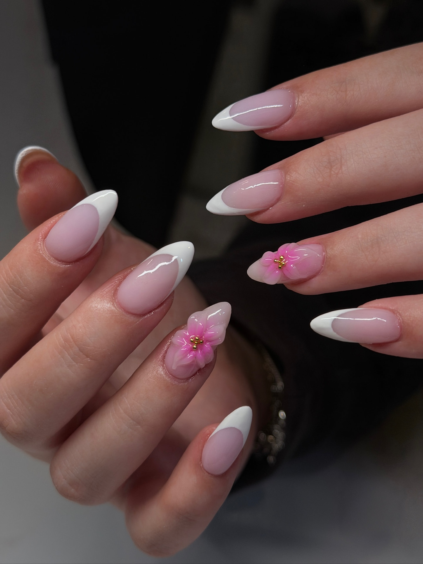 Blume Nail Bar - Luxury Nail Salon — milky pink French almond nails with 3D hand-painted orchid accents