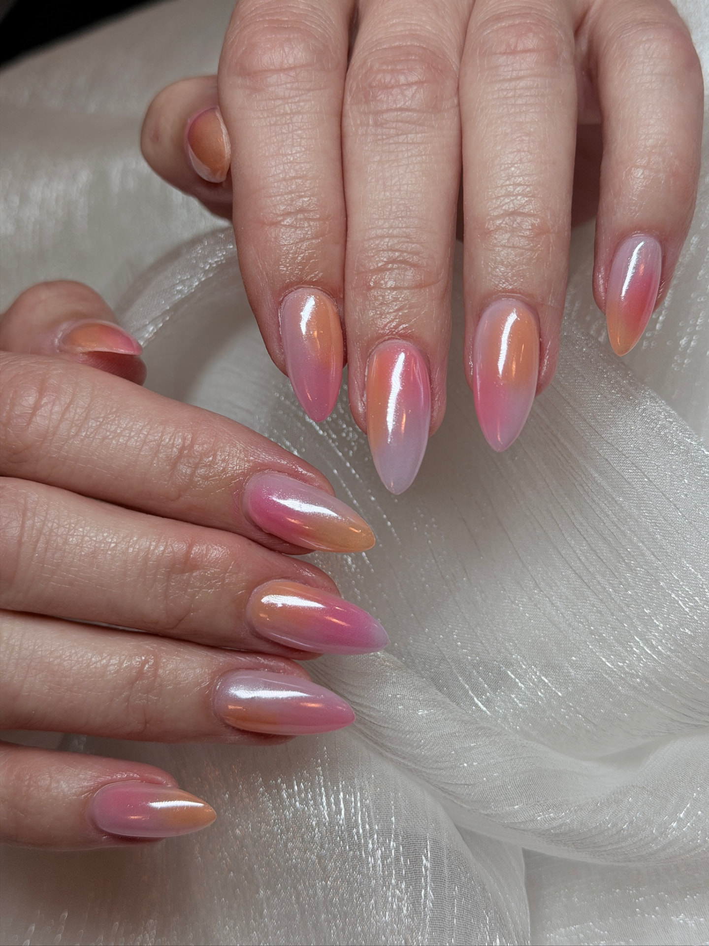 Blume Nail Bar - Luxury Nail Salon — almond nails in sunset chrome blending coral, pink and lilac