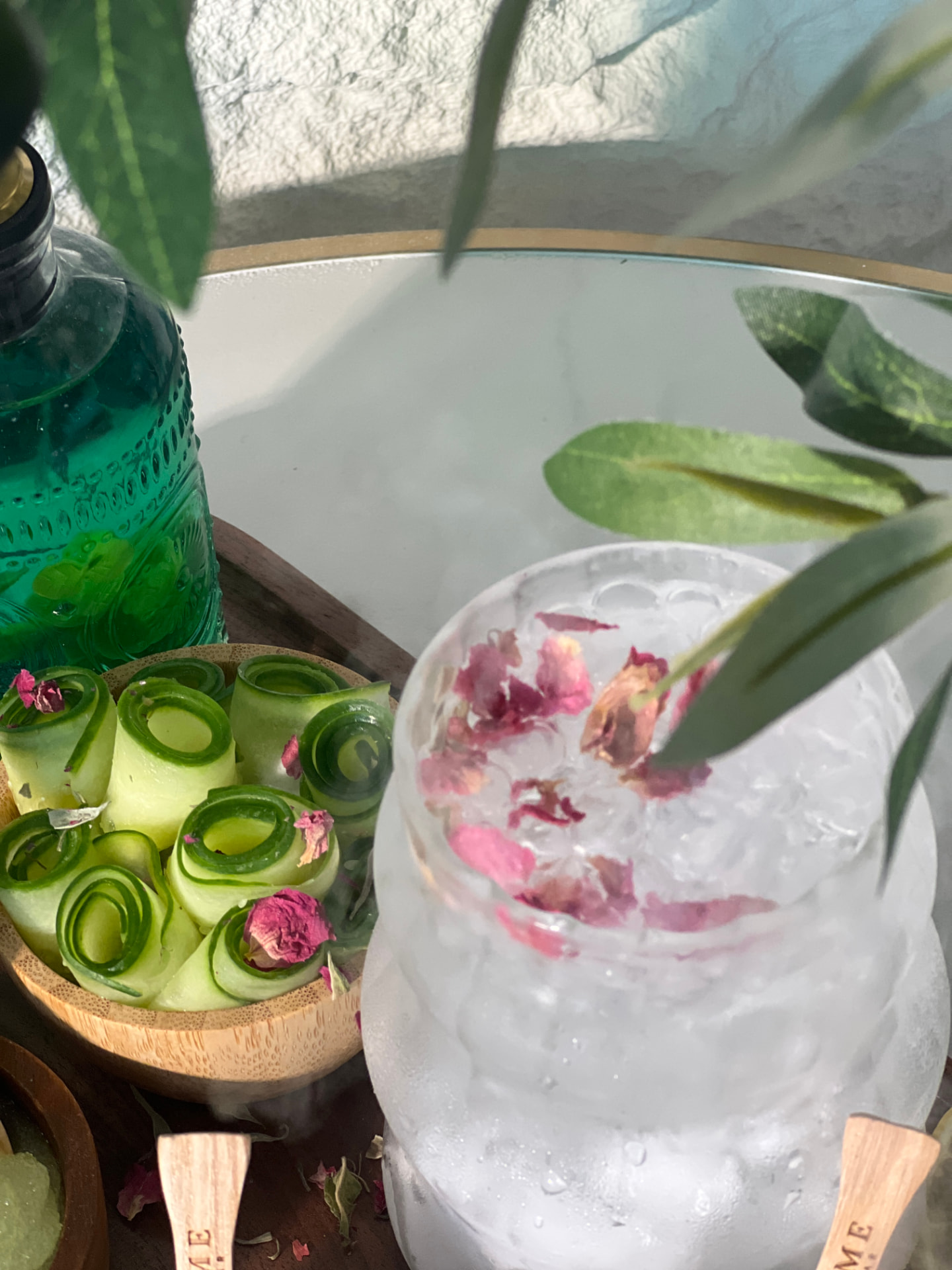 Blume Nail Bar - Luxury Nail Salon — chilled signature drink with cucumber and rose petals